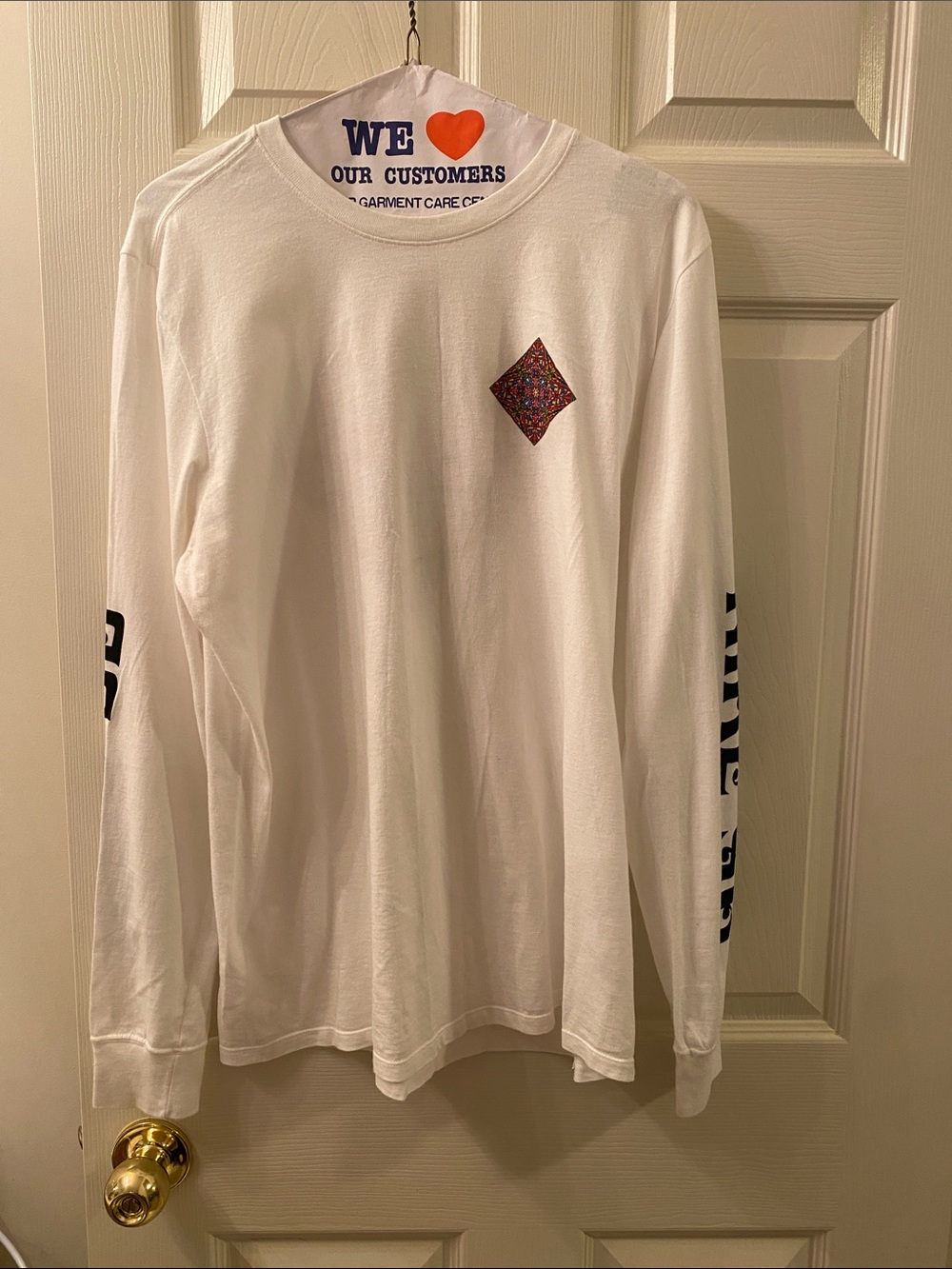 Nike White Long-Sleeve Tee with Small Multicolor Chest Diamond
